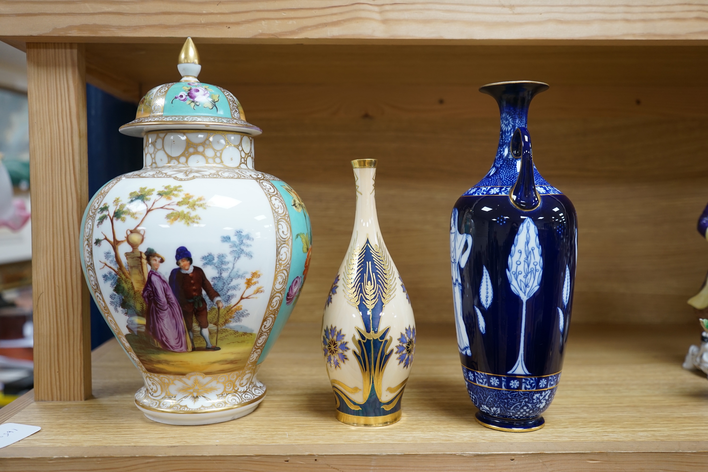 A Dresden porcelain jar and cover, 32cm high, a Doulton Burslem Grecian revival vase and and a Continental Art Nouveau bottle vase (3) condition - Dresden and Doulton restored necks otherwise visible condition